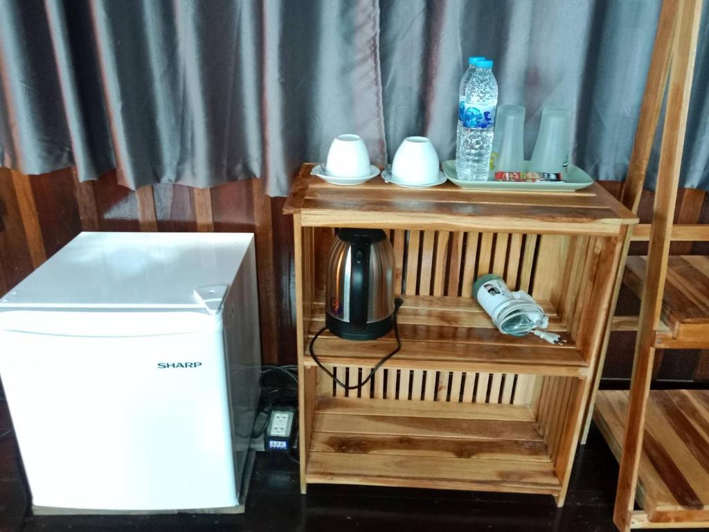 Kuchyň nebo kuchyňský kout v ubytování สุขเสมอ โฮมสเตย์ (Suk-Samer homestay)