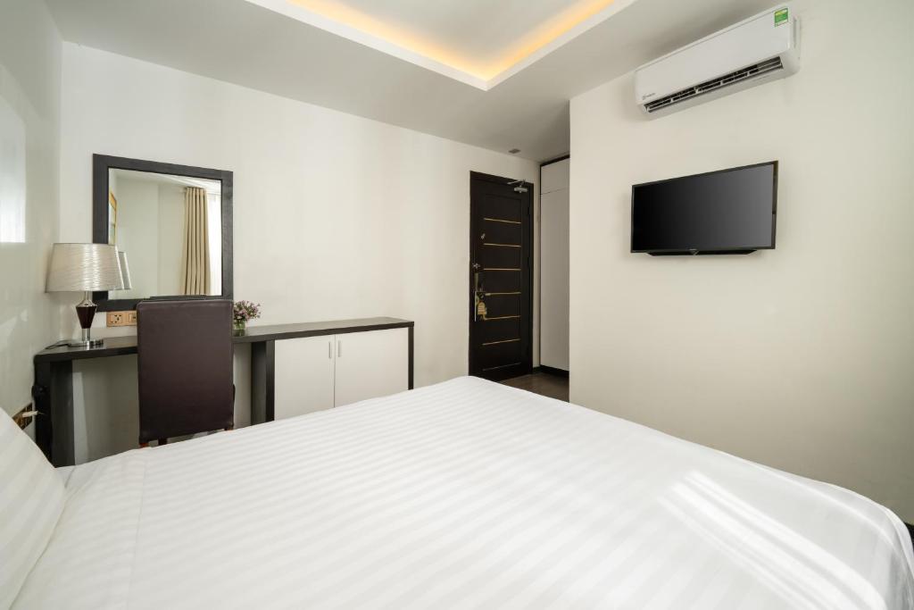 TV a/nebo společenská místnost v ubytování Hanami Hotel Danang