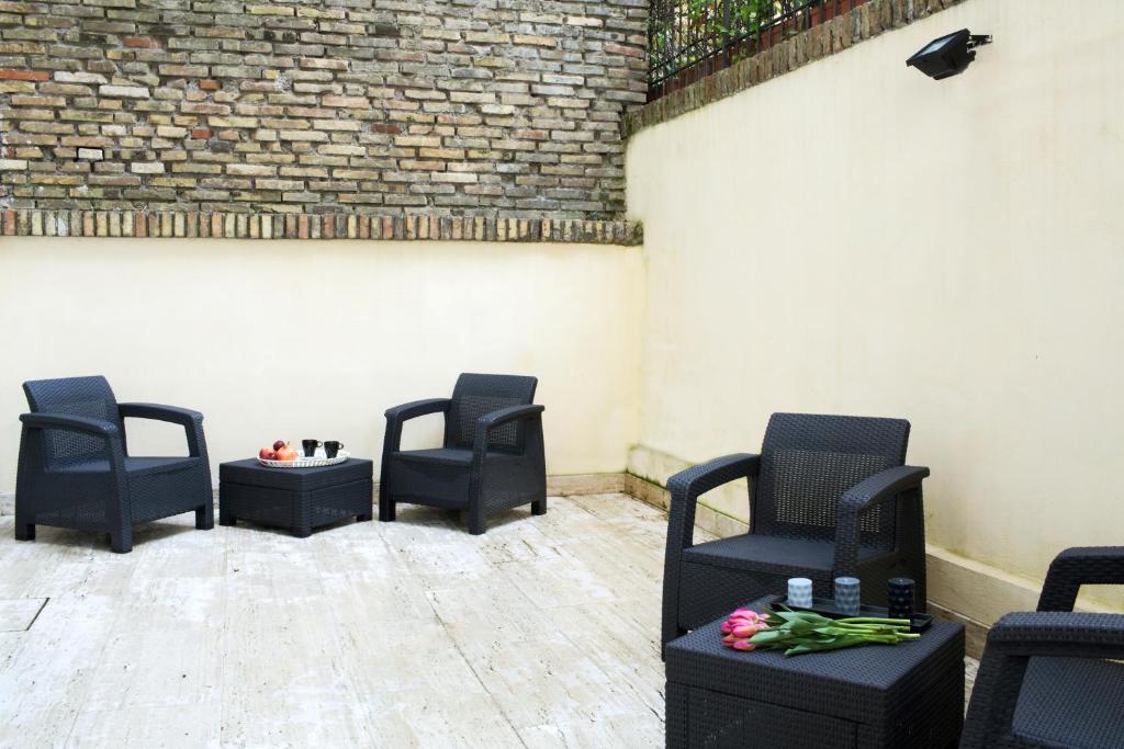 A seating area at The One Prati Rooms