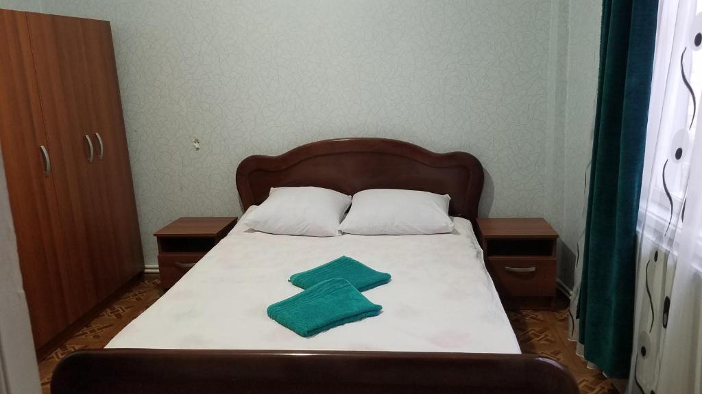 Postel nebo postele na pokoji v ubytování Guest House Green Rose