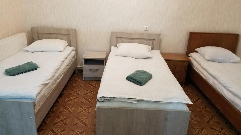 Postel nebo postele na pokoji v ubytování Guest House Green Rose