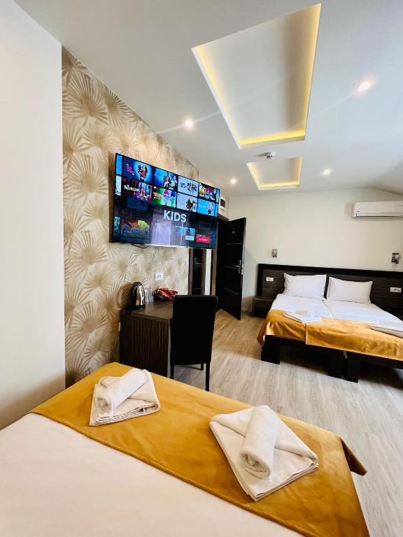 Postel nebo postele na pokoji v ubytování Side One Design Hotel Garni