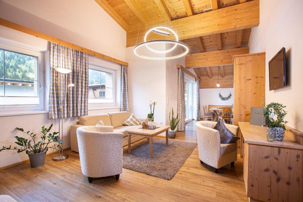 Posezení v ubytování Alphaus Aparthotel