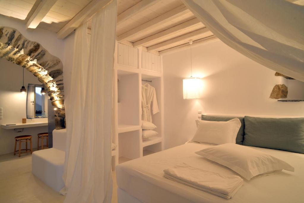 Säng eller sängar i ett rum på Villa Aerino I & ΙΙ