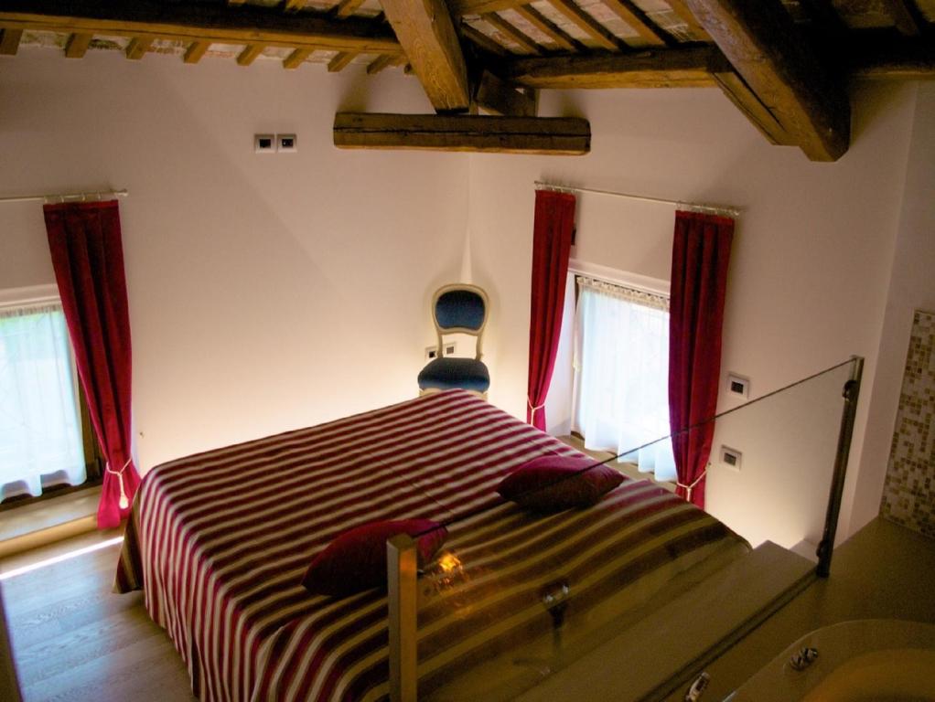 Postel nebo postele na pokoji v ubytování Villa Butussi - L'ospitalità del Vino