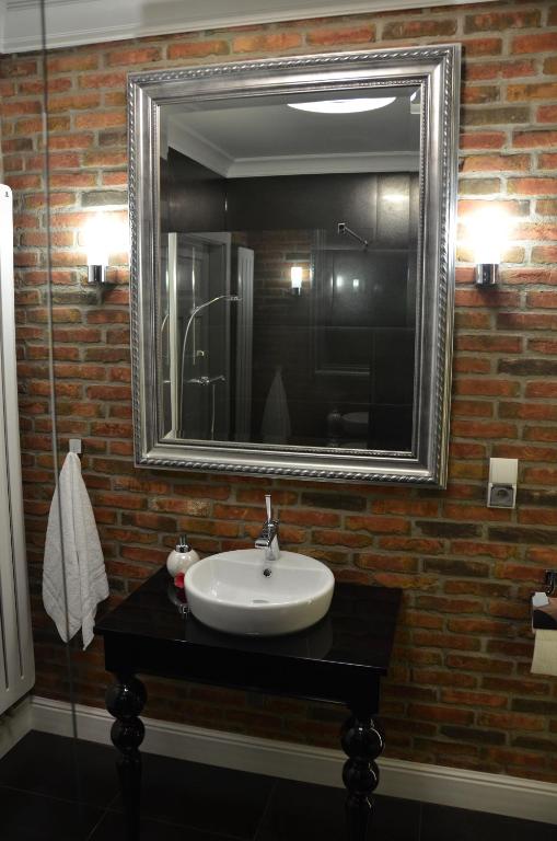 Kúpeľňa v ubytovaní Apartamenty Adalbert