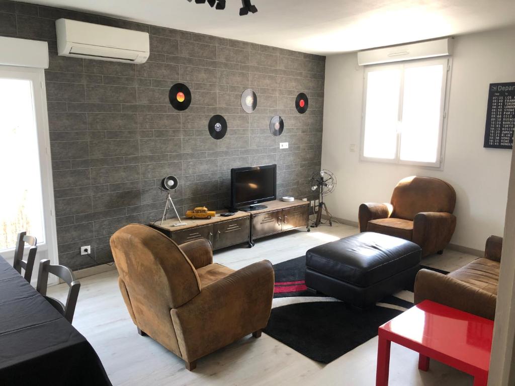 Posezení v ubytování Bel appartement proche chateau Laurens