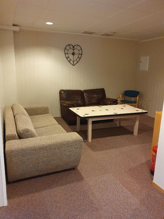 Posezení v ubytování Leirvik i Sogn-Apartment