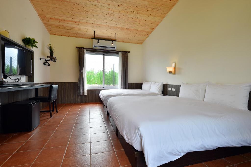 Postel nebo postele na pokoji v ubytování Leju Diary B&B