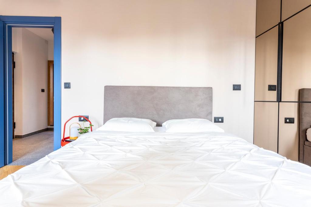Postel nebo postele na pokoji v ubytování Circle Rooms