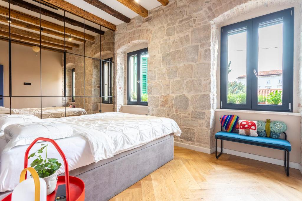 Postel nebo postele na pokoji v ubytování Circle Rooms