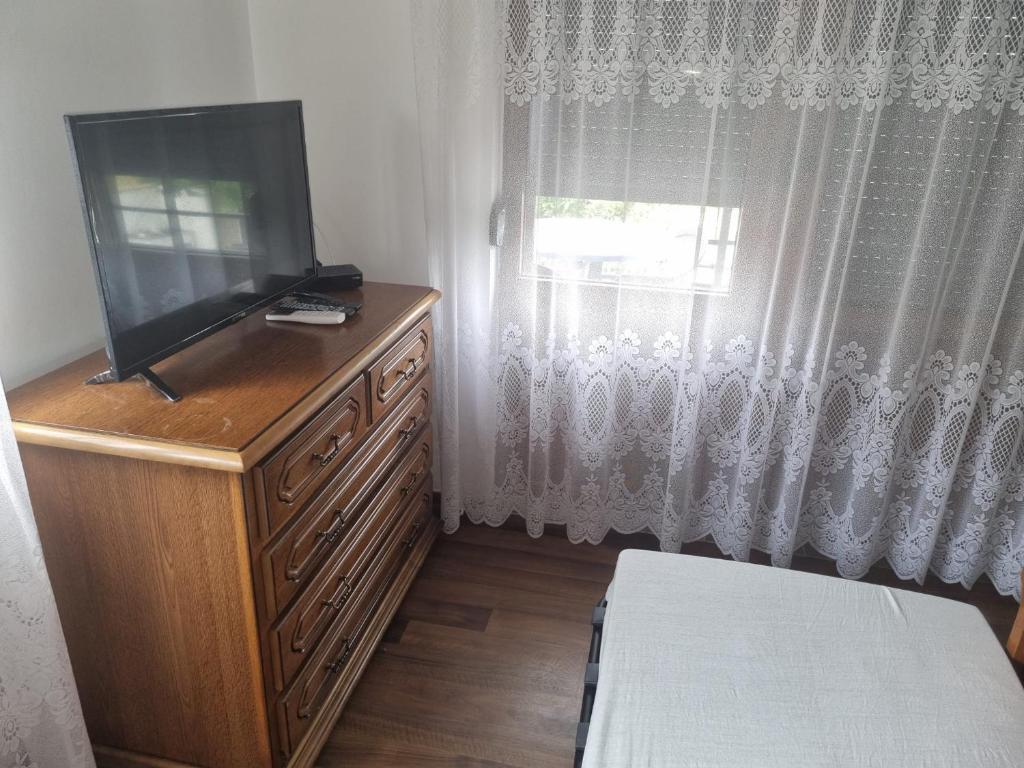 TV a/nebo společenská místnost v ubytování Vila Orizont