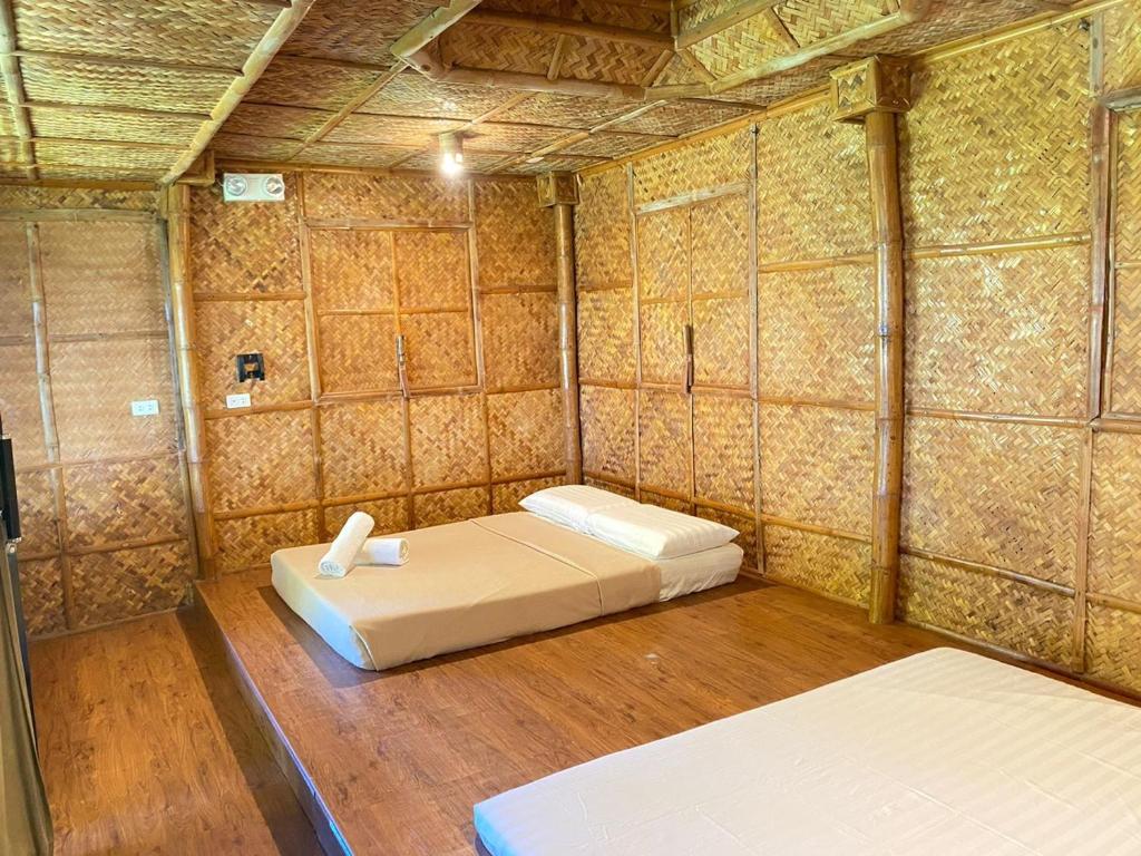 Postel nebo postele na pokoji v ubytování Hijo Resorts Davao