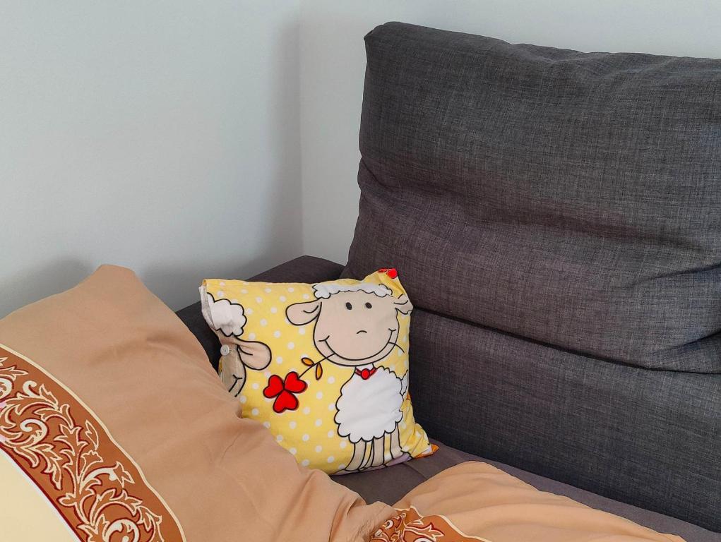Postel nebo postele na pokoji v ubytování Sétány Apartman