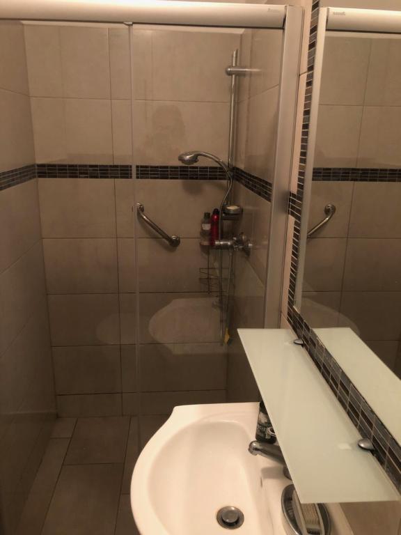 Kúpeľňa v ubytovaní Csopak Apartman