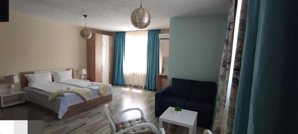 Postel nebo postele na pokoji v ubytování BeLApartment