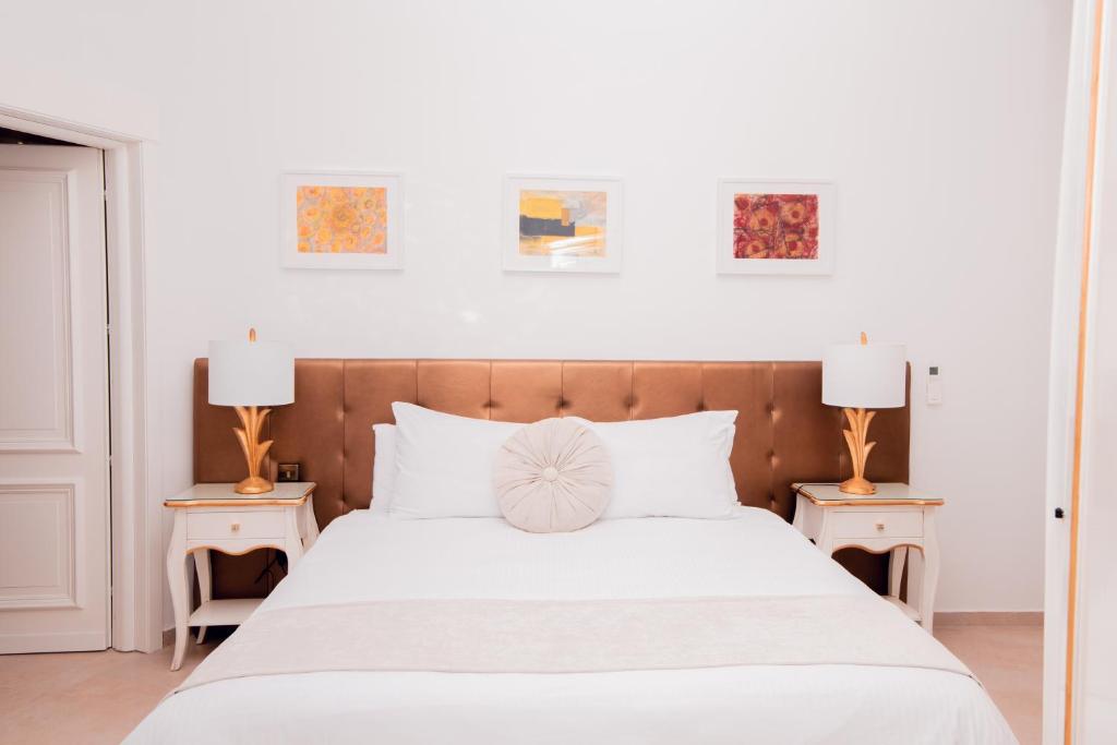Cama o camas de una habitación en Giorgio Boutique Hotel