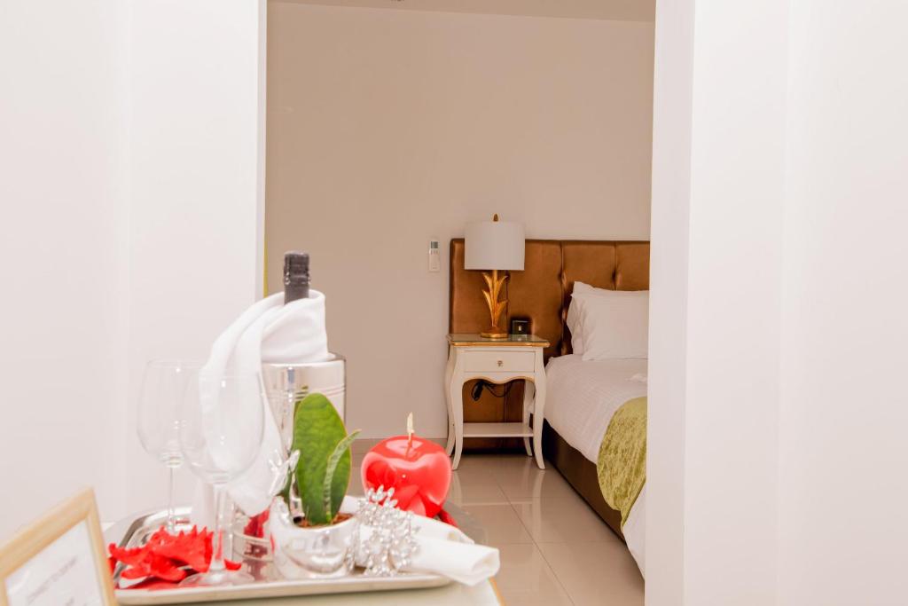 Cama o camas de una habitación en Giorgio Boutique Hotel