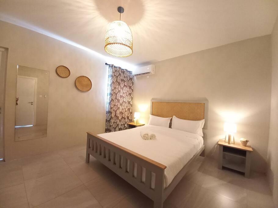 Postel nebo postele na pokoji v ubytování Bois Mapou Self Catering Apartments Unit 203