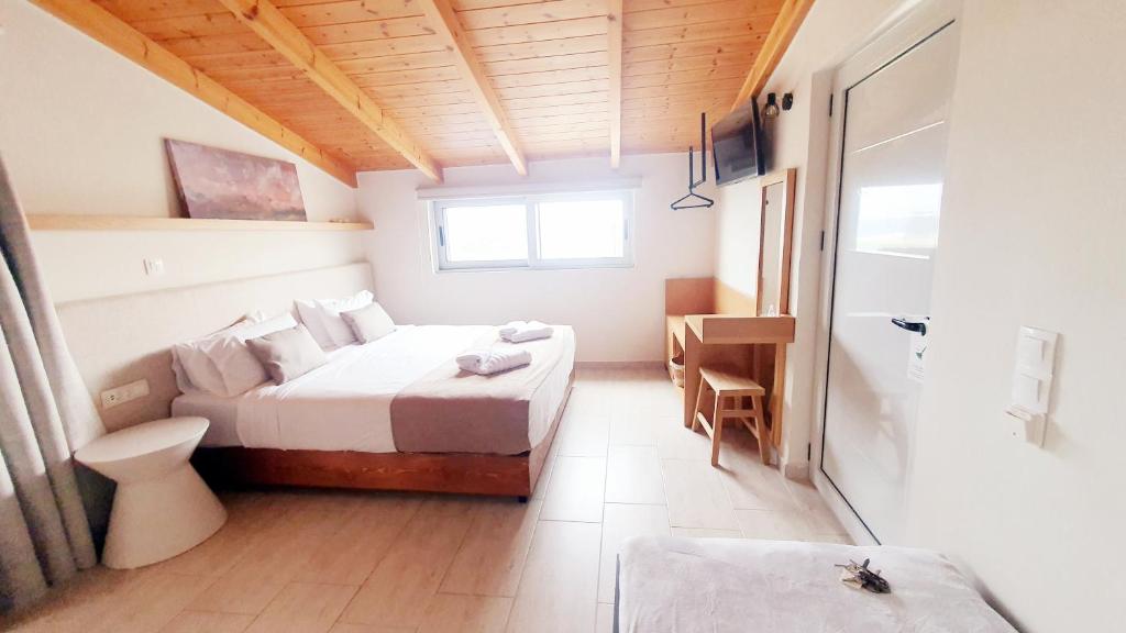 Postel nebo postele na pokoji v ubytování Oliva Beach
