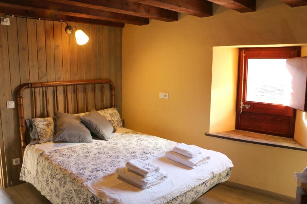 Postel nebo postele na pokoji v ubytování Cal Sastre