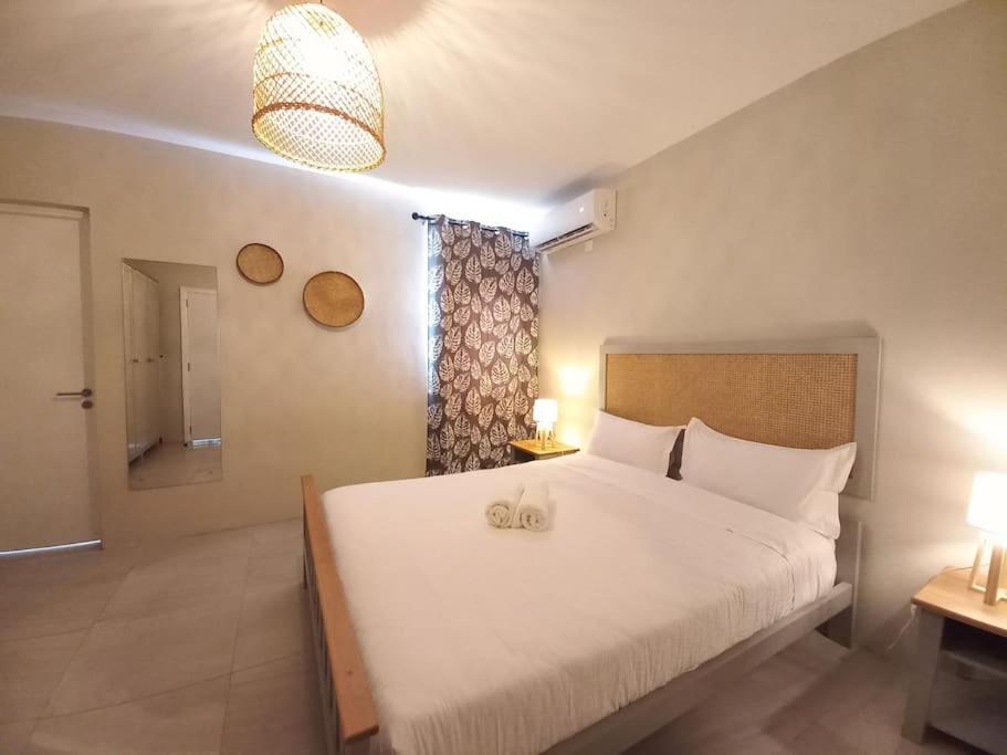 Postel nebo postele na pokoji v ubytování Bois Mapou Self Catering Apartments Unit 201