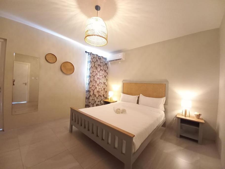 Postel nebo postele na pokoji v ubytování Bois Mapou Self Catering Apartments Unit 201