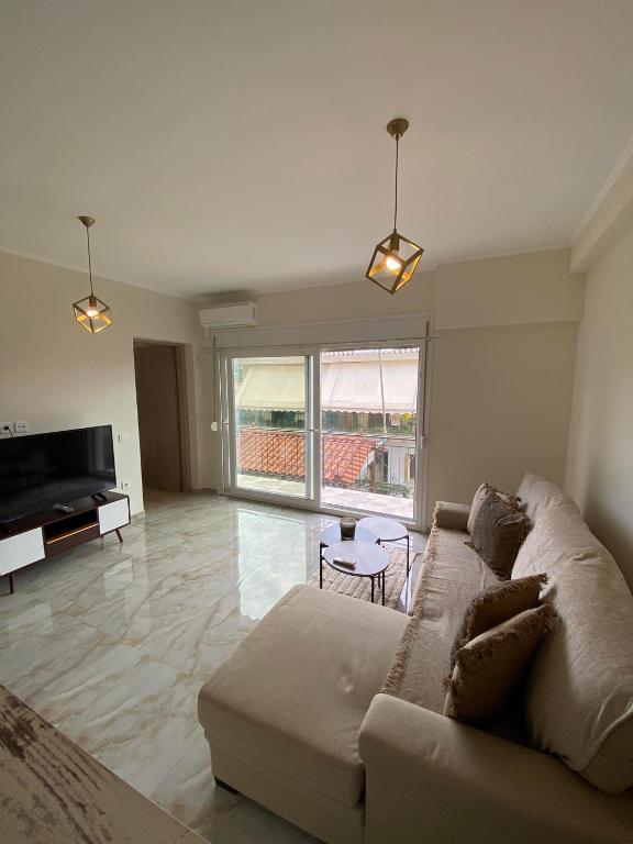 Posezení v ubytování Kaldis Apartment
