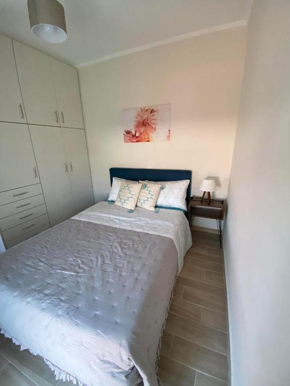 Postel nebo postele na pokoji v ubytování Kaldis Apartment