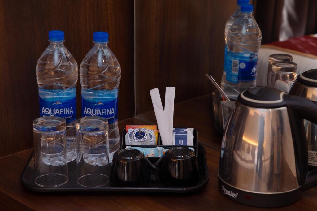 Příslušenství pro přípravu čaje a kávy v ubytování SUPREME STAY