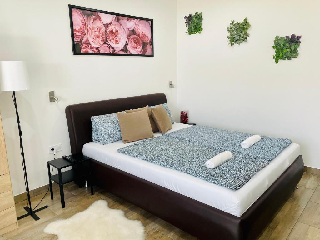 Postel nebo postele na pokoji v ubytování Attila Studio Apartments