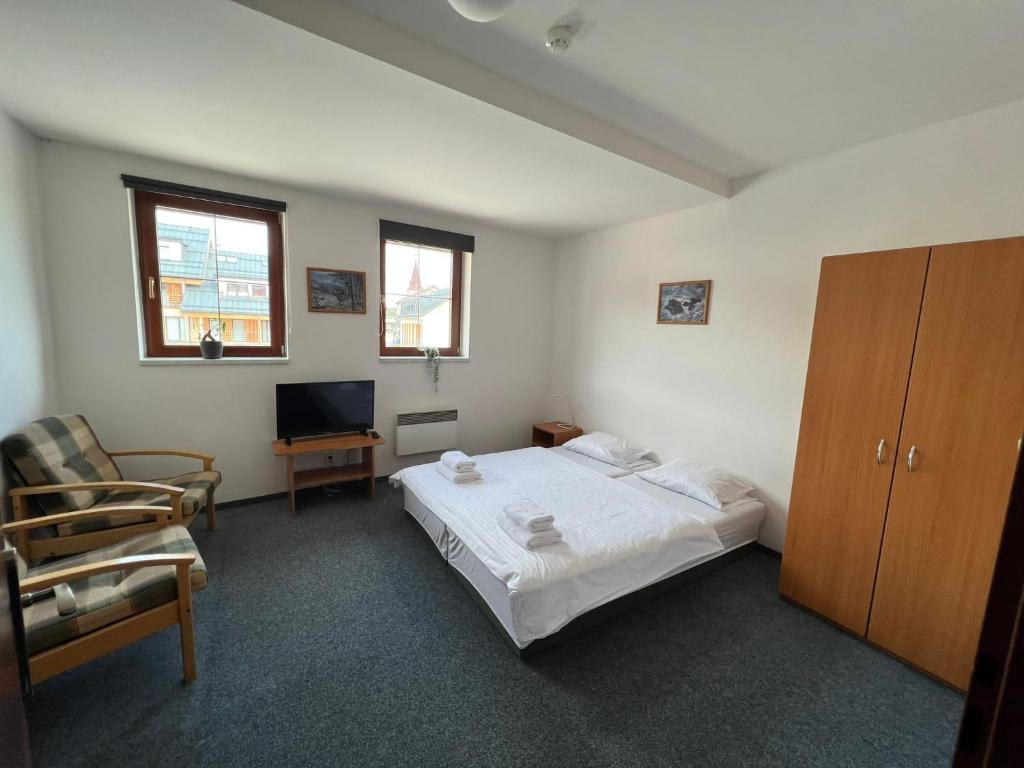 Postel nebo postele na pokoji v ubytování Kvildahotel