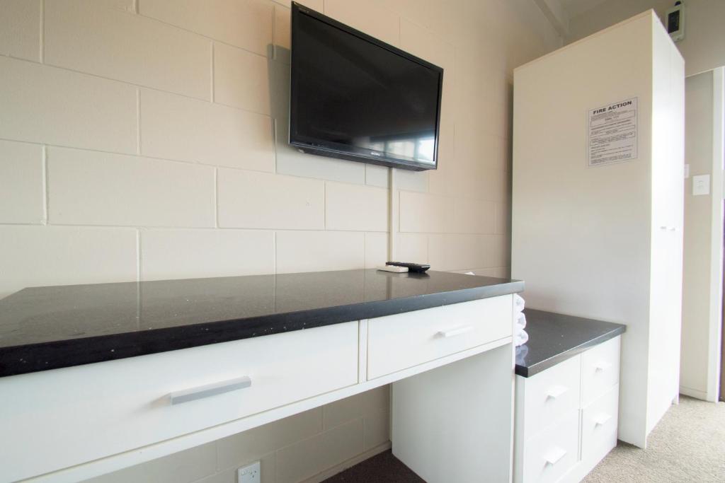TV a/nebo společenská místnost v ubytování Middlemore Motel