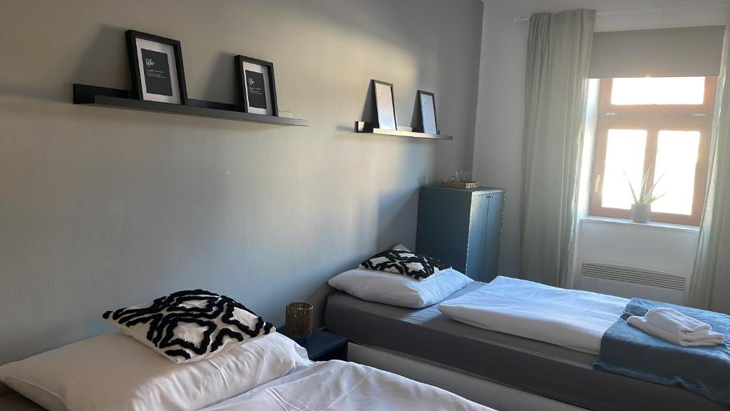 Postel nebo postele na pokoji v ubytování Kvildahotel