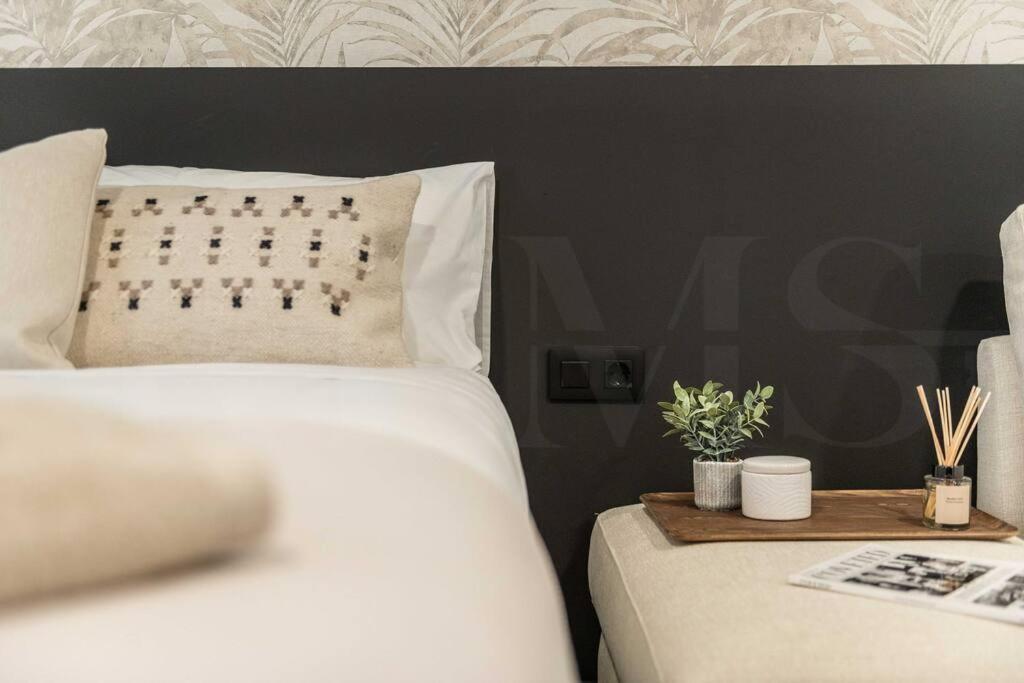 Posteľ alebo postele v izbe v ubytovaní Chic intimate studio in the heart of Malaga by REMS