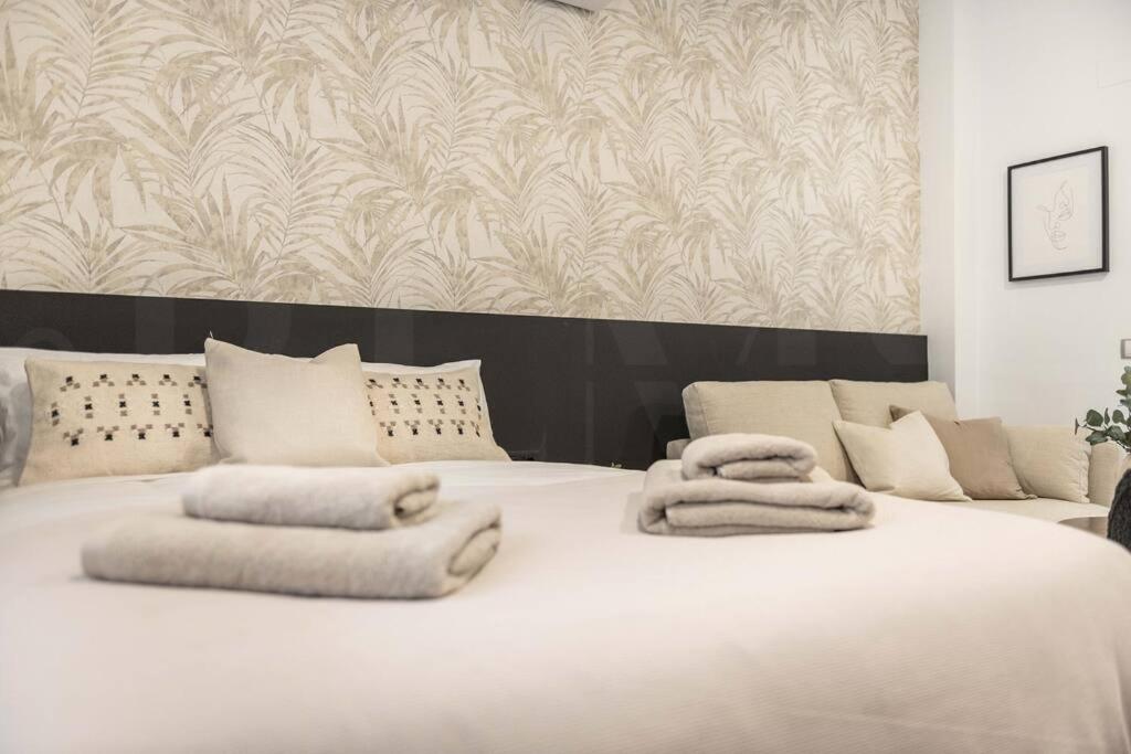 Posteľ alebo postele v izbe v ubytovaní Chic intimate studio in the heart of Malaga by REMS