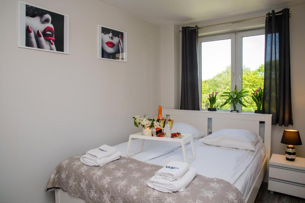 Posteľ alebo postele v izbe v ubytovaní Maya's Flats & Resorts - Gdańsk Szopy