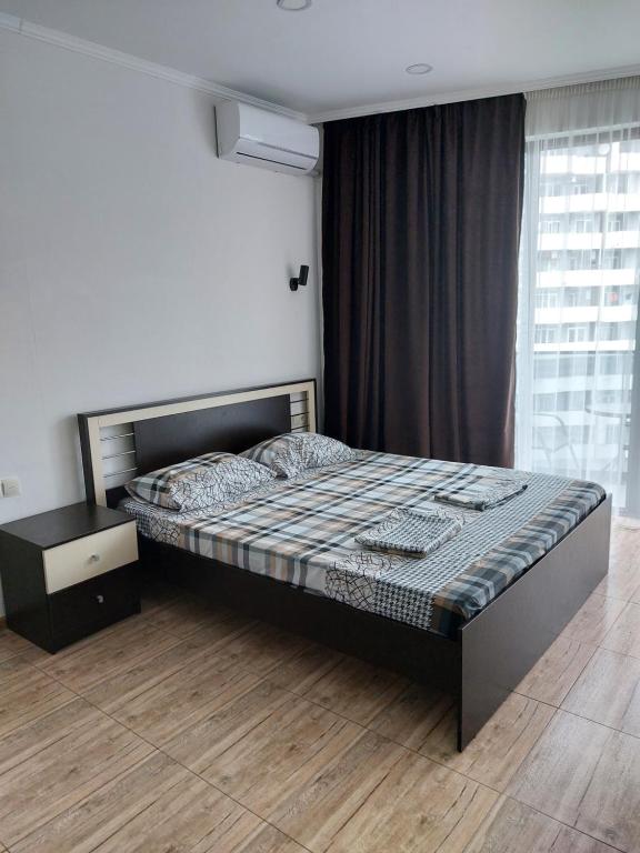 Postel nebo postele na pokoji v ubytování Apartment Vesta Batumi 2