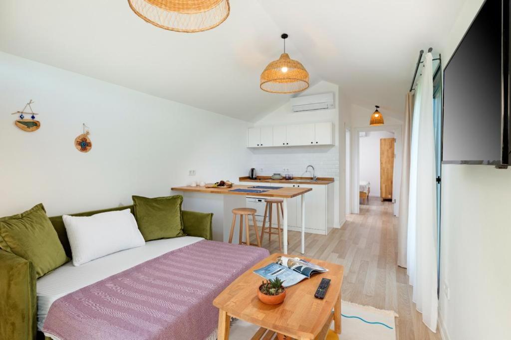 TV a/nebo společenská místnost v ubytování Kairos Hotel