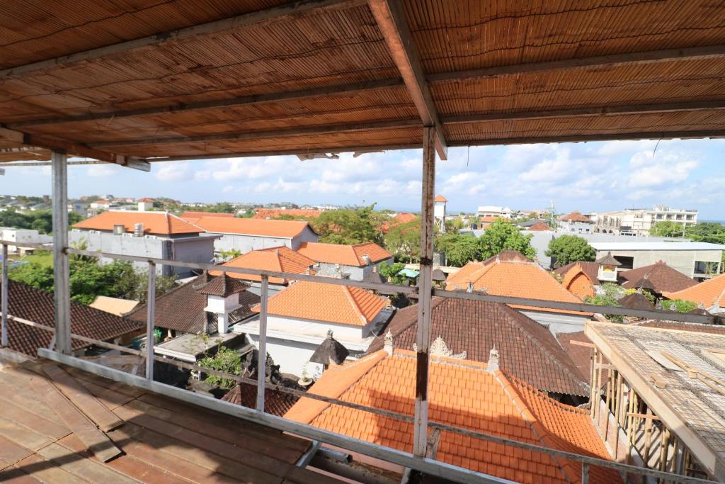 a view of a city from the roof of a building at Seabreeze Hostel Bali in Canggu