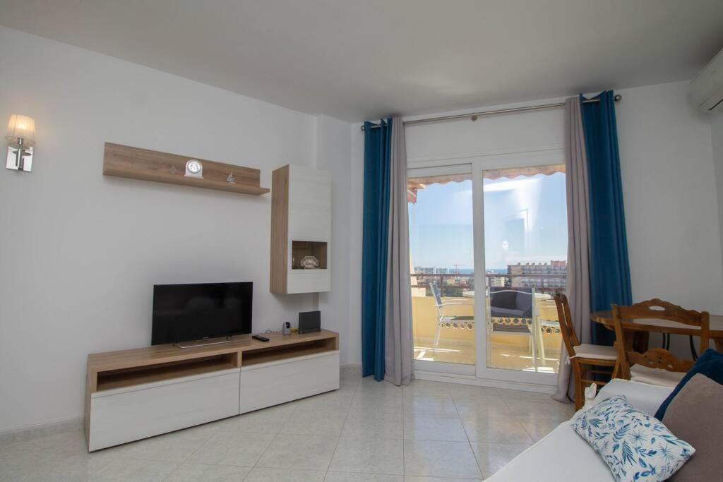 Televízia a/alebo spoločenská miestnosť v ubytovaní Duquesa 603 By IVI Real Estate