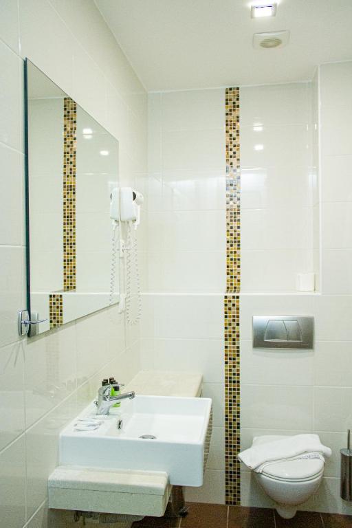 Koupelna v ubytování Hotel Rodon