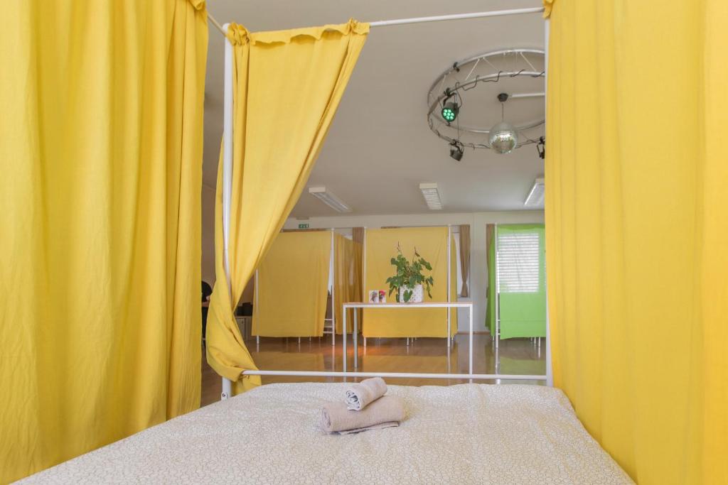 Postel nebo postele na pokoji v ubytování TEJ HOSTEL