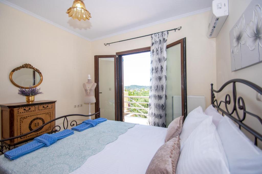 Postel nebo postele na pokoji v ubytování Green Lagoon Villa by "elite"