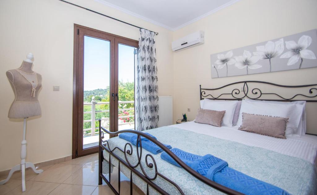 Postel nebo postele na pokoji v ubytování Green Lagoon Villa by "elite"