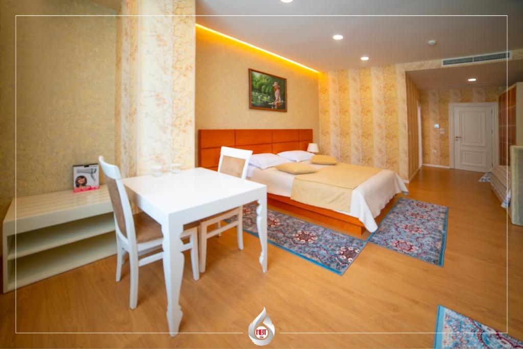 Postel nebo postele na pokoji v ubytování NBT Hotel Reps