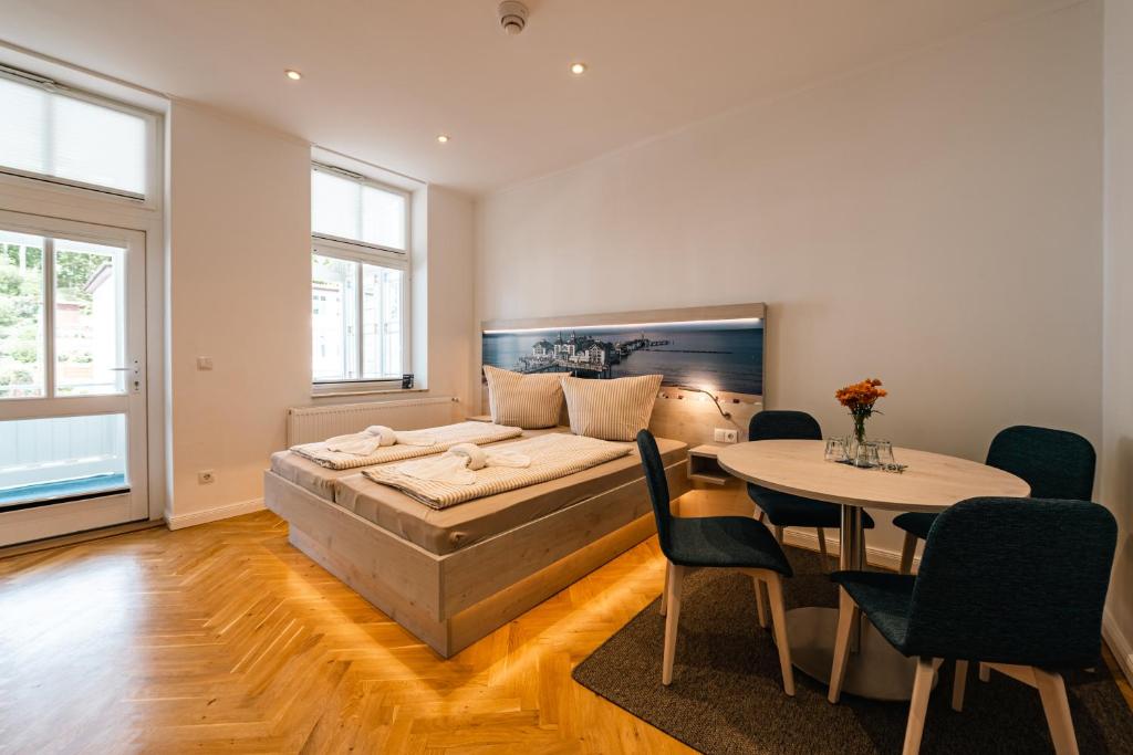 Postel nebo postele na pokoji v ubytování Villa Sand im Schuh