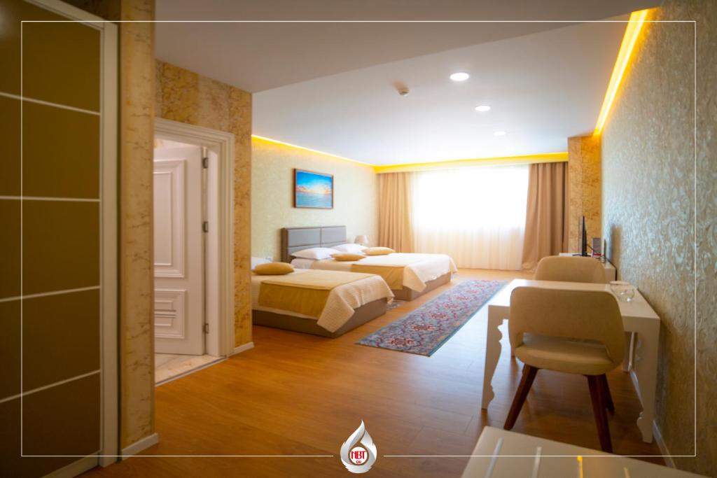 Postel nebo postele na pokoji v ubytování NBT Hotel Reps