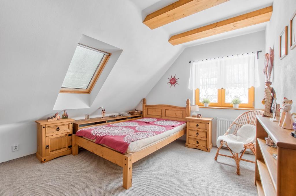 Postel nebo postele na pokoji v ubytování Chata Pohádka Vyšní Lhoty