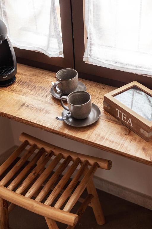 Příslušenství pro přípravu čaje a kávy v ubytování Ōrigins Hotel Boutique - Adults Only